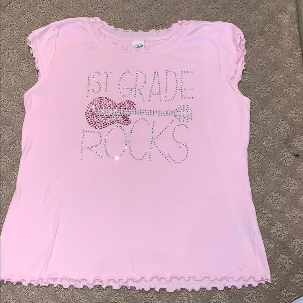 1st Grade Rocks tee size Medium